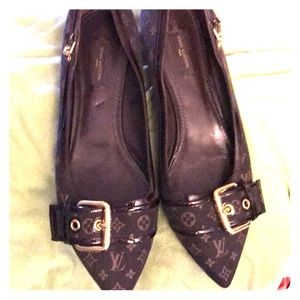 Louis Vuitton pointed toe monogrammed flats